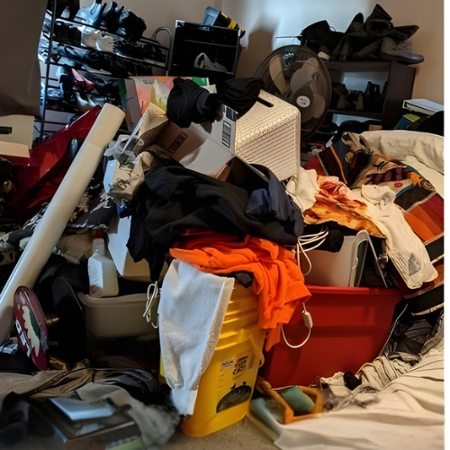 Closet piled with clothes and storage bins before a CNX Clean Pro home cleaning
