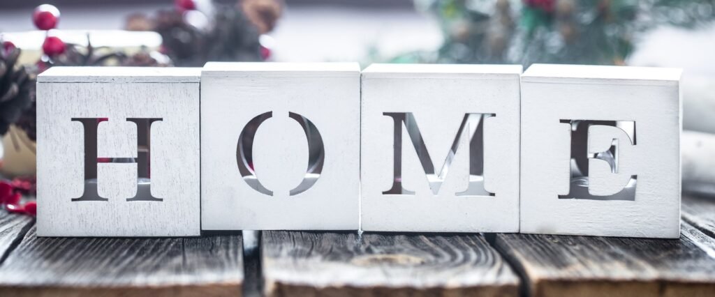 Wooden letter blocks spelling HOME, the kind of home CNX Clean Pro cleans across Philadelphia